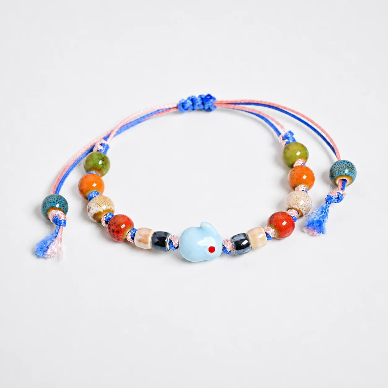 Handmade Blue Rabbit Ceramic Bracelet – Adjustable Woven Wax Cord Bunny Charm Jewelry