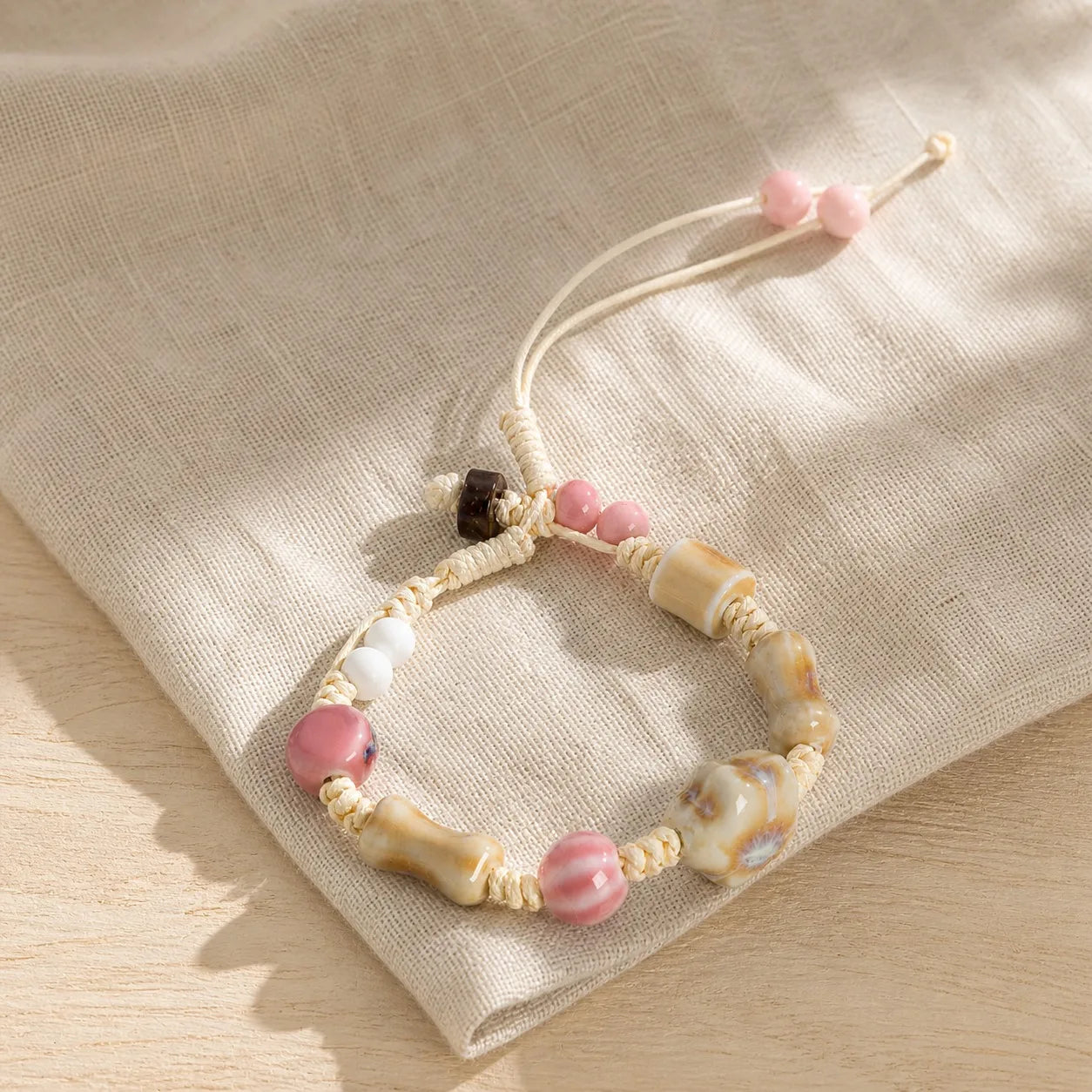 Handmade Ceramic Bone Bead & Star Charm Bracelet – Adjustable Wax Cord Artisan Jewelry