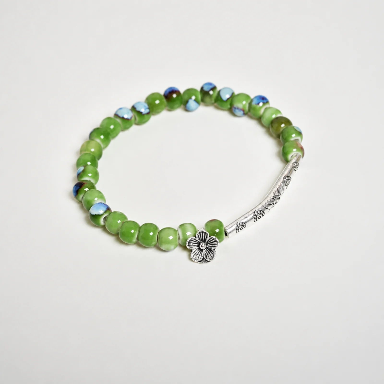 Handmade Green Ceramic Flower Bead Bracelet – Braided Elastic Cord Artisan Jewelry