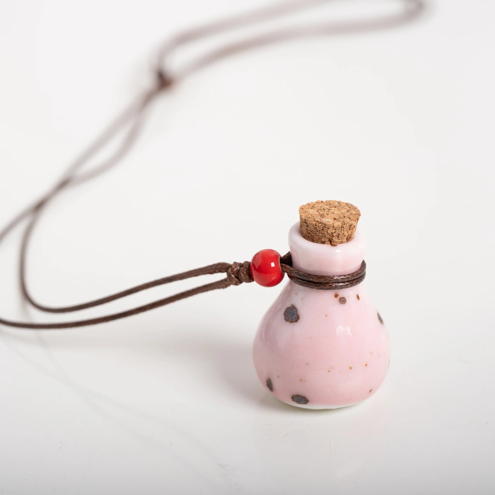 Handmade Pink Ceramic Perfume Bottle Necklace – Adjustable Wax Cord Aromatherapy Jewelry