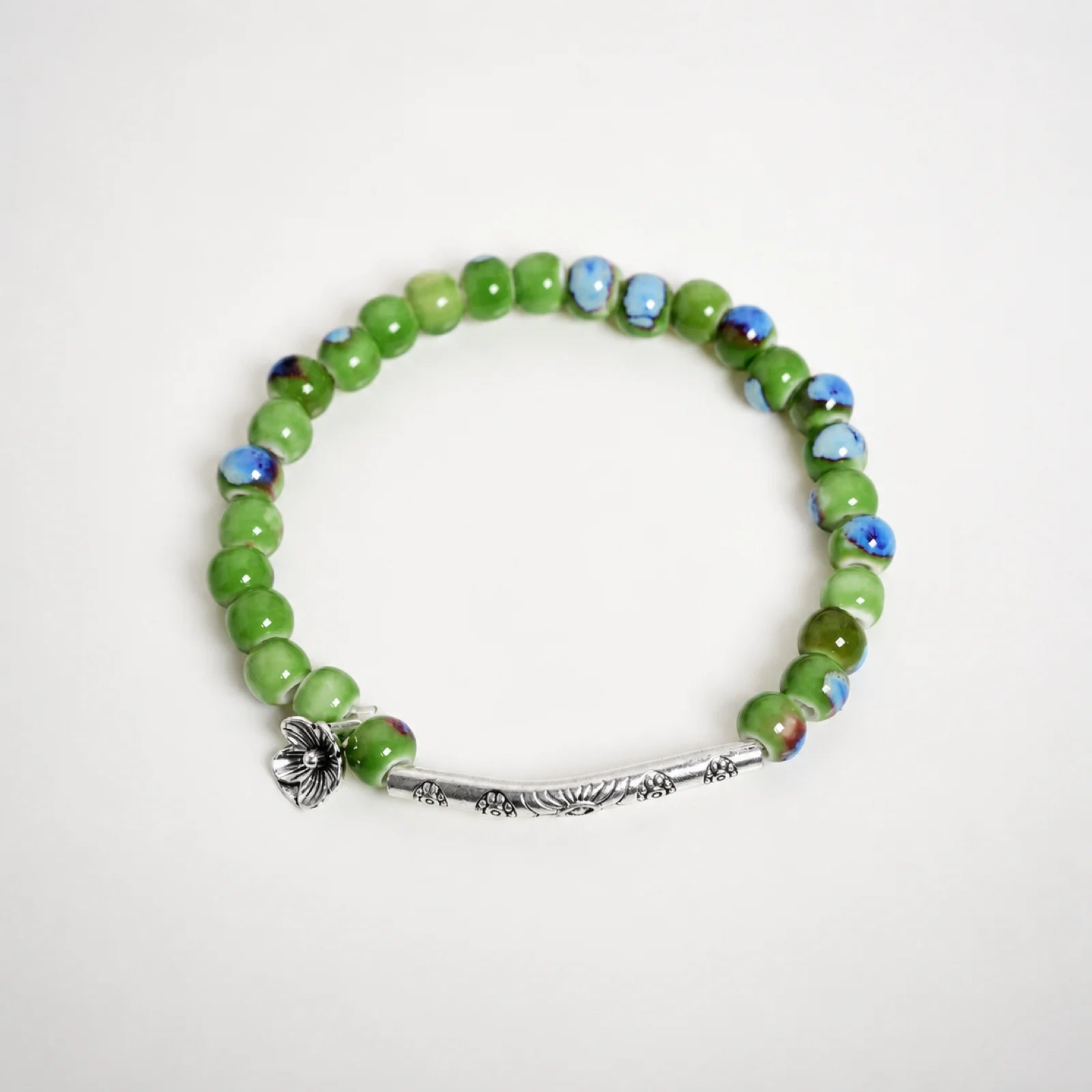 Handmade Green Ceramic Flower Bead Bracelet – Braided Elastic Cord Artisan Jewelry
