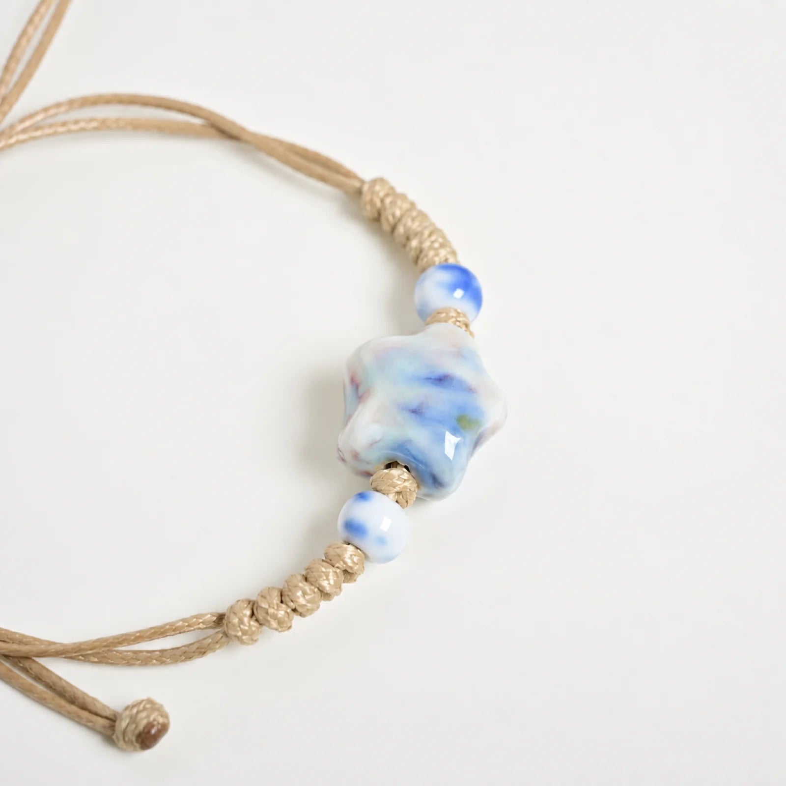 Handmade Blue & Green Star Ceramic Bead Bracelet – Adjustable Woven Wax Cord Artisan Jewelry