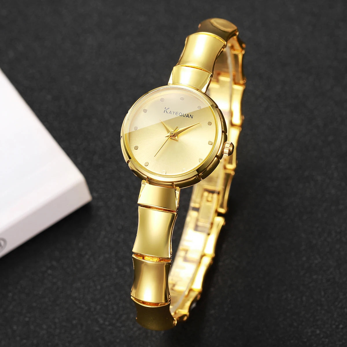 Elegant Women's Gold Bamboo Bracelet Quartz Watch – Luxury Dress Wristwatch