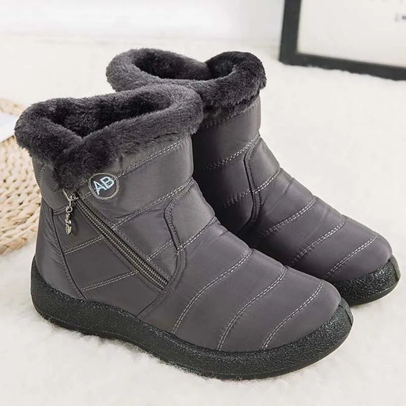 Comfortable waterproof winter boots for women with soft fur and zipper design. Perfect for snowy days.